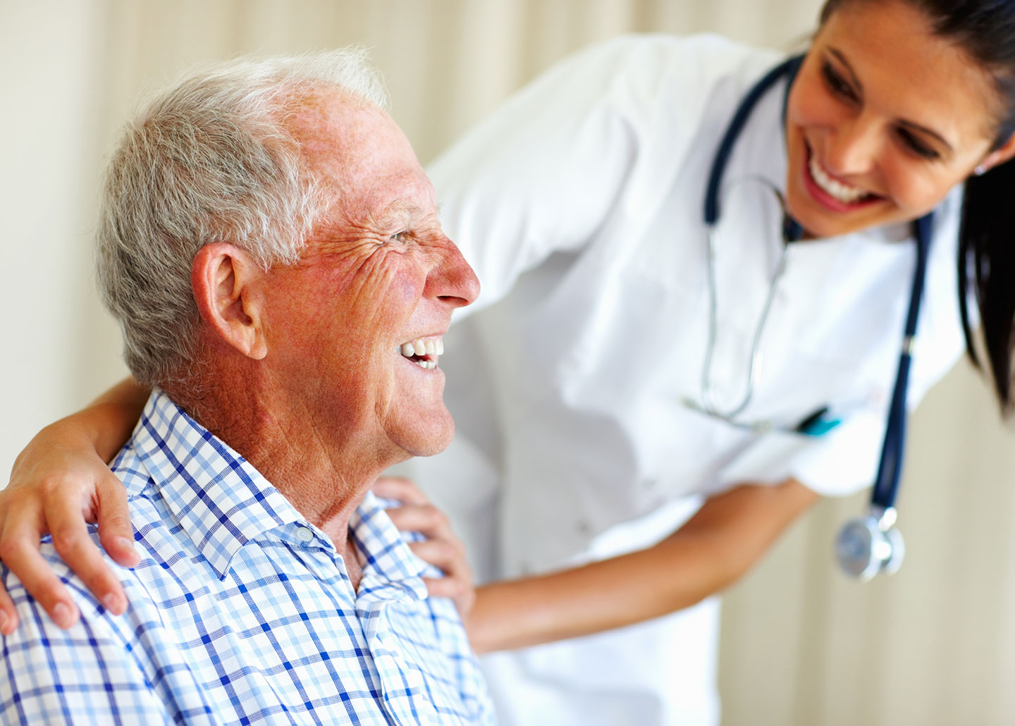 doctor laughing with older men